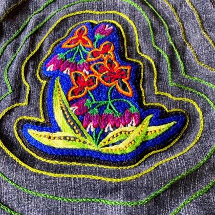 Upcycled hand embroidered hand appl..