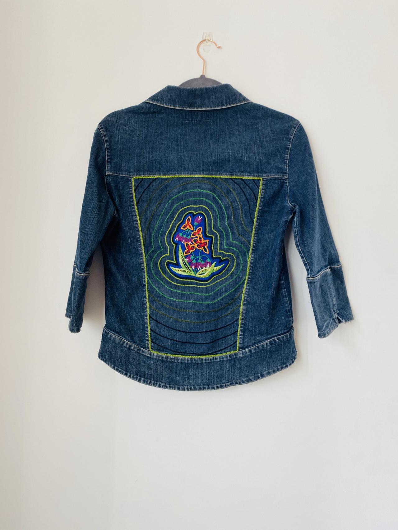 Upcycled hand embroidered hand appliquéd patch denim jacket size S .